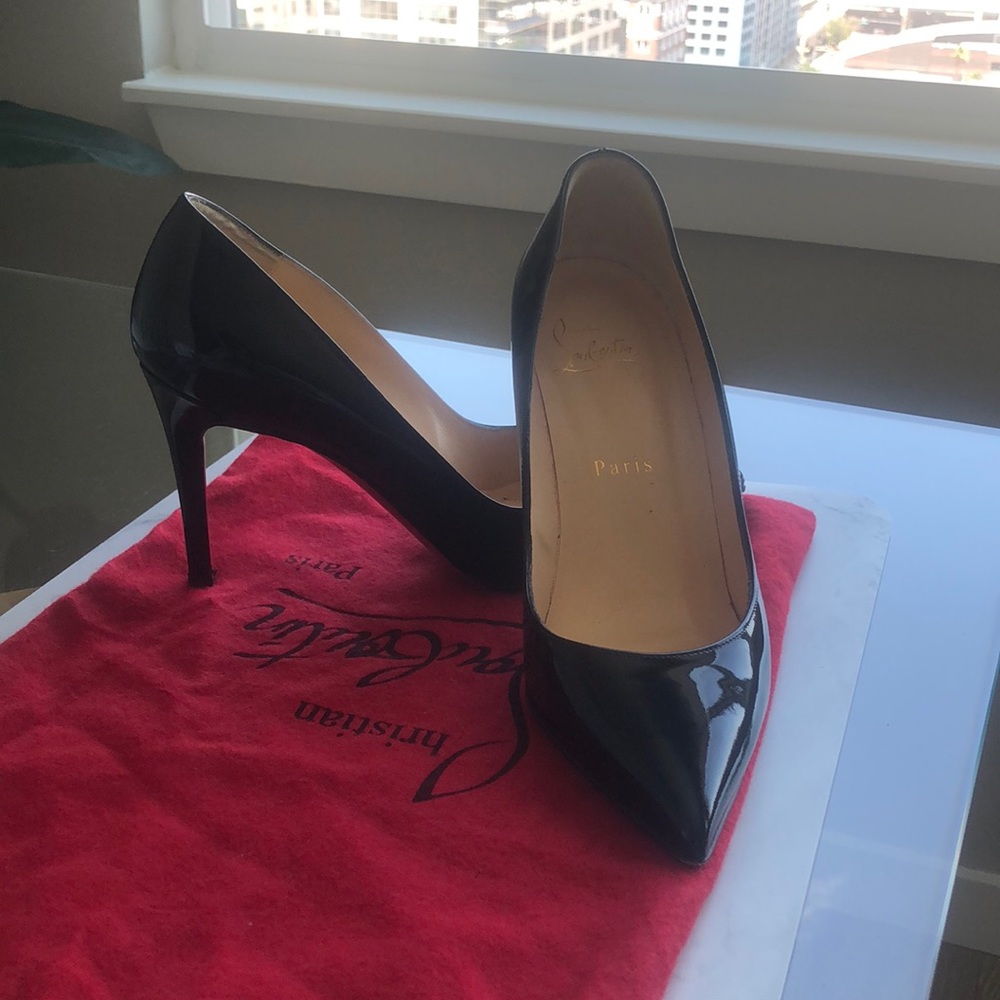Black shiny Pigalle Christian Louboutin heels. USED -red bottoms are scuffed